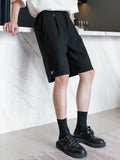 Black suit shorts